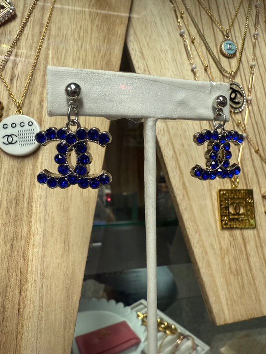 Silver Tone Drop Earrings with Blue Gem Accents