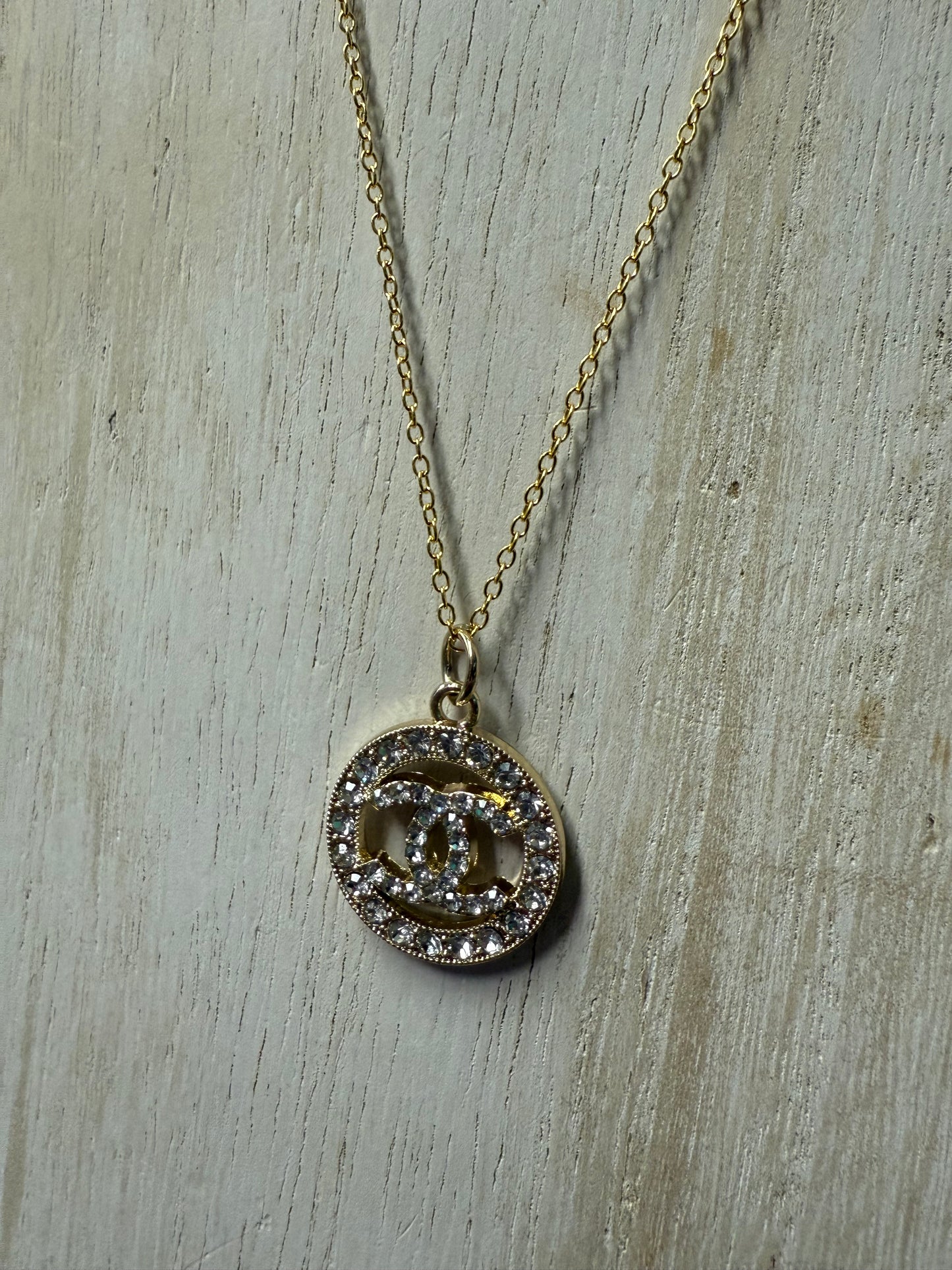 Gold Tone Crystal Circle Pendant Necklace