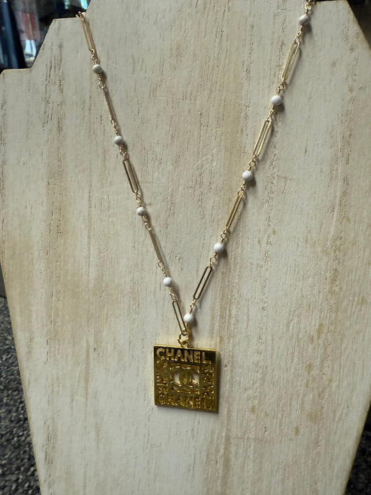 Gold Tone Square Pendant Necklace with Pearl Accents
