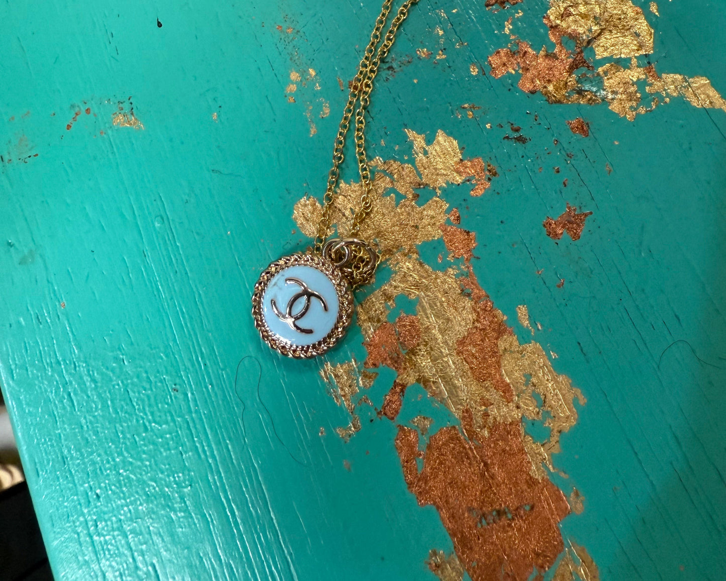 Gold Tone Round Pendant Necklace with Blue Enamel Accent